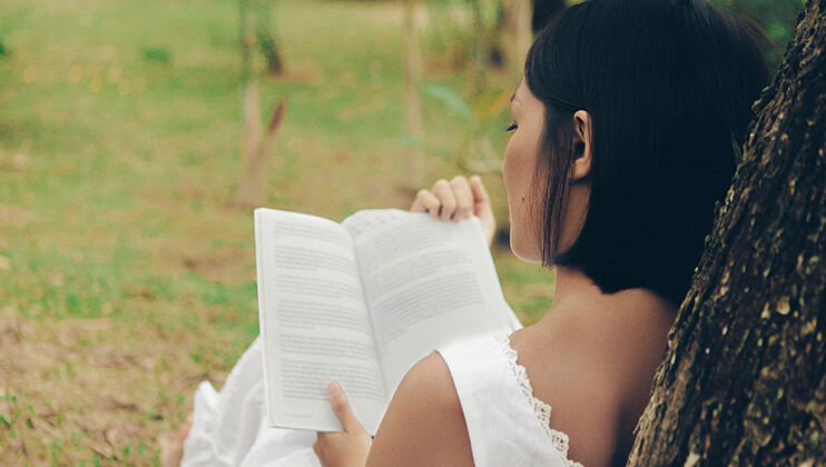 read your favorite book in the shade of a tree